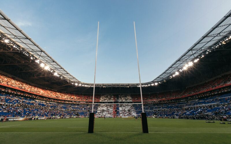 Rugby posts in a packed stadium